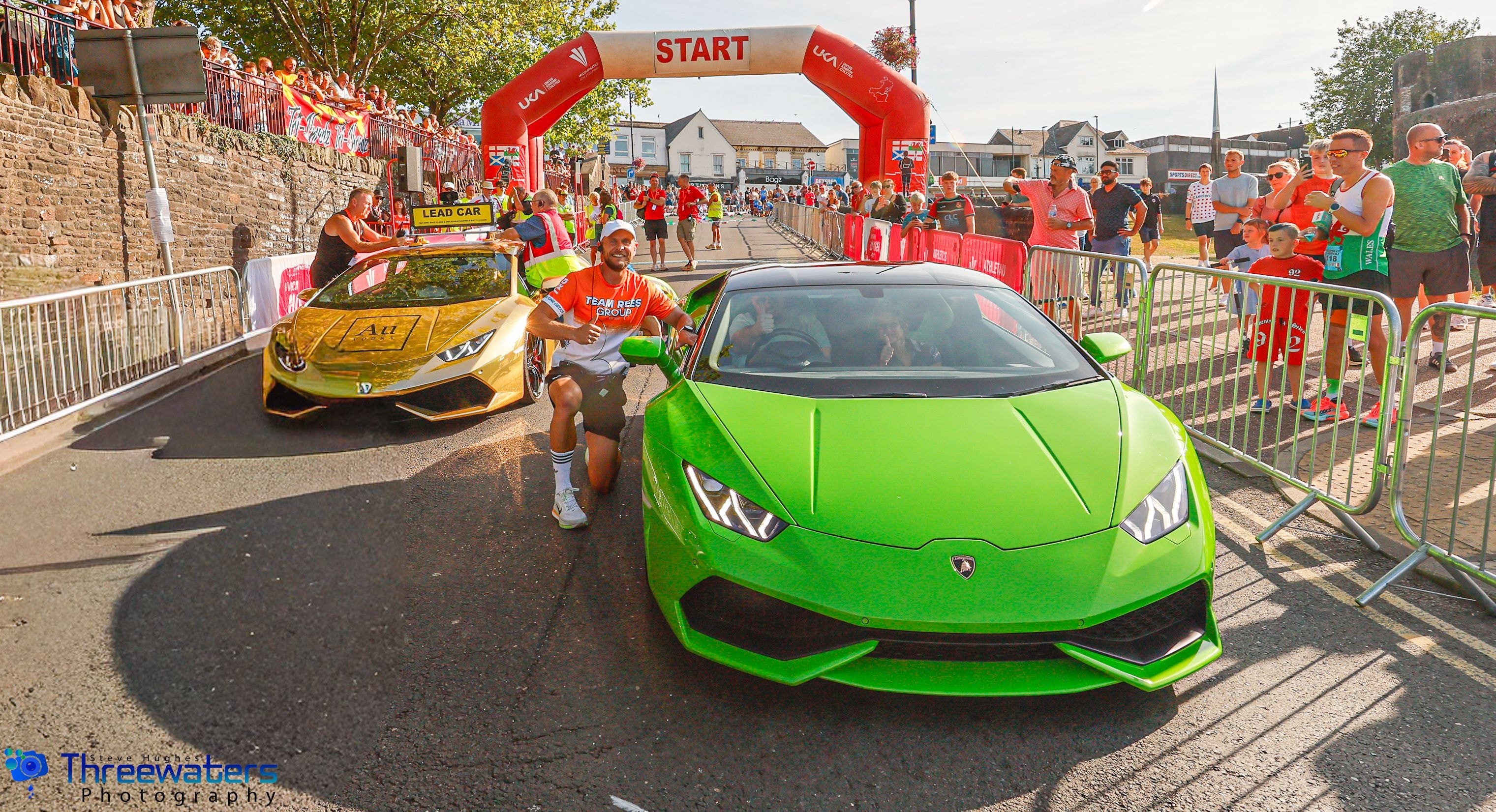 Lamborghinis at the Caerphilly 5KM start line with packed crowds